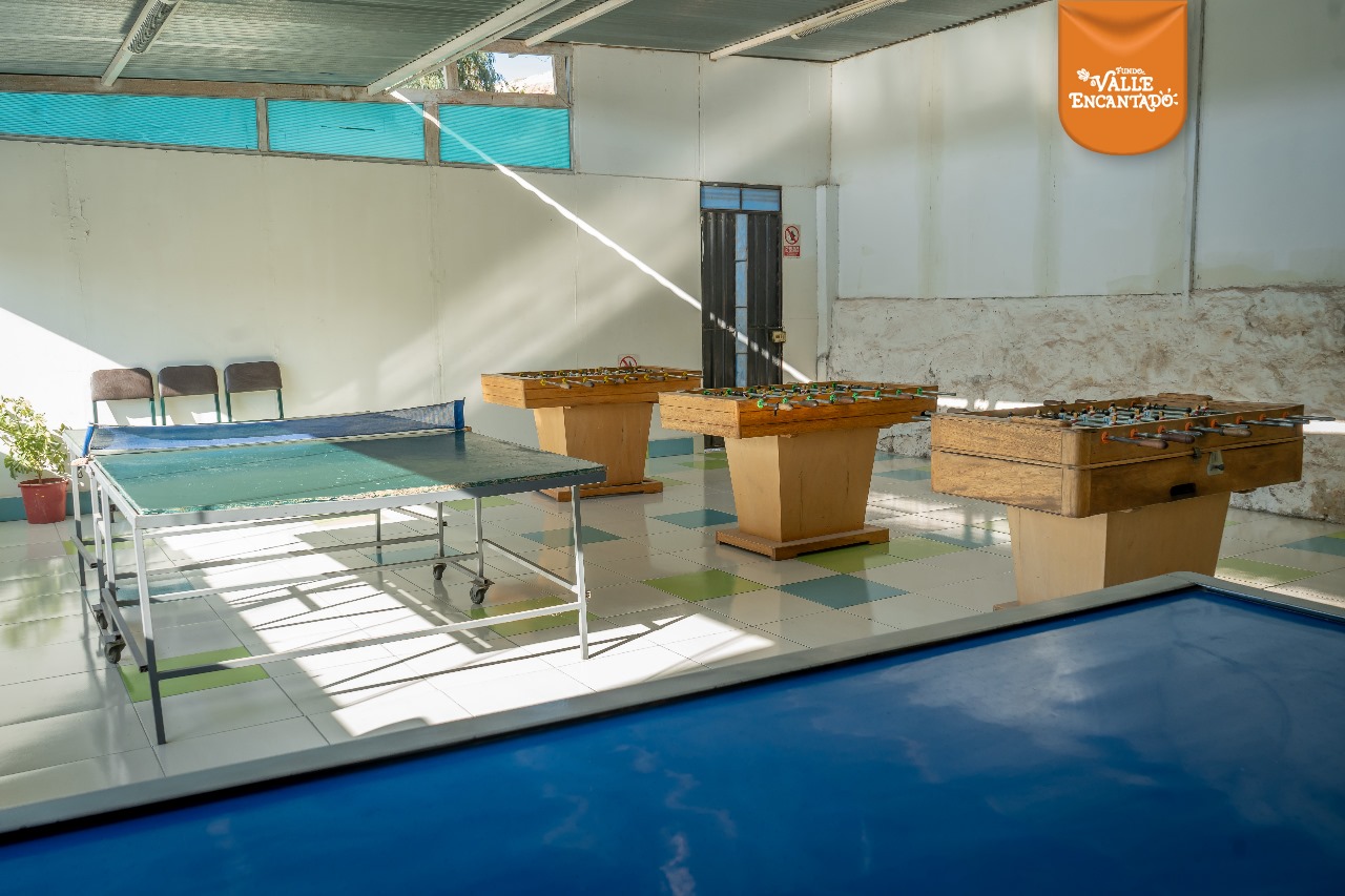 Área de billar y ping pong